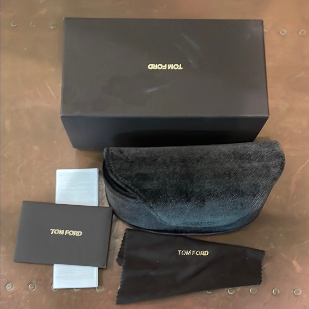 Tom Ford sunglasses box and a case